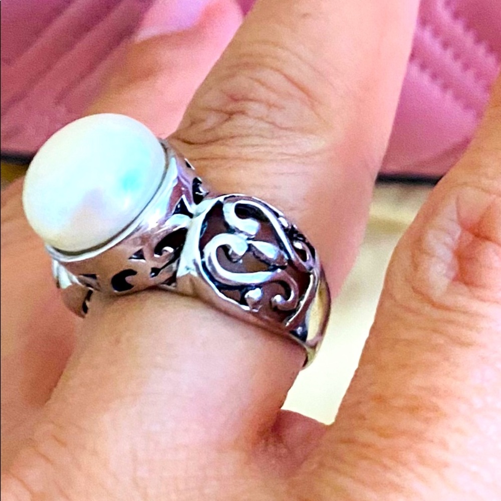 Sterling silver ring it’s a bit bigger than size 7 💍